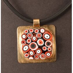Tube mosaic in black, white and red, bronze setting