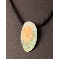 Textured copper oval with green patina