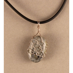 Polished stone in Fine Silver Net
